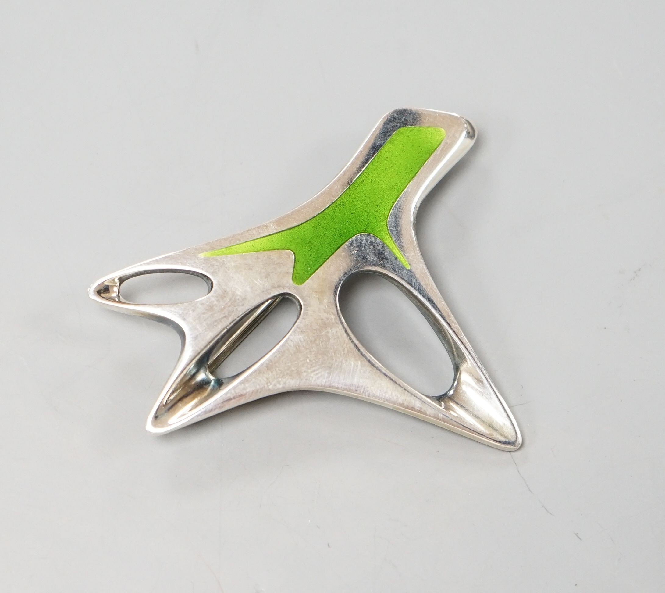 A Henning Koppel Georg Jensen sterling and green enamel abstract brooch, no. 323, 57mm.